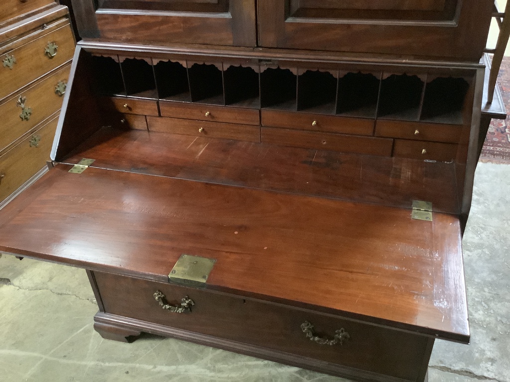 A George III mahogany bureau cabinet, width 114cm, depth 58cm, height 222cm